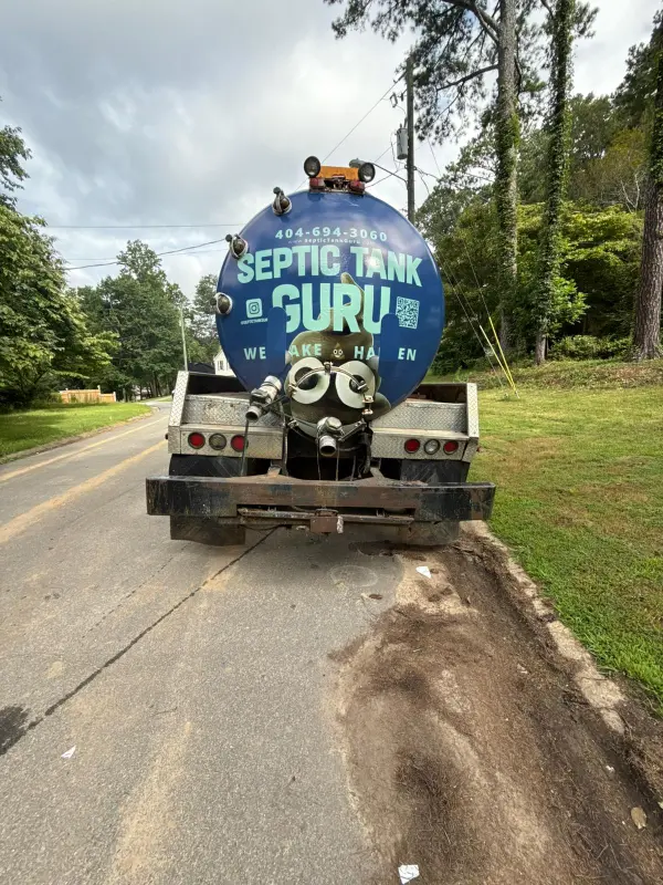 Sewer Line Repair 5 Septic service truck parked on-site during a service visit